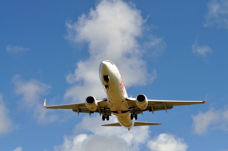 Tourist airplane flying in the sky